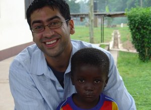 Dr. Agnihotri hugging small child